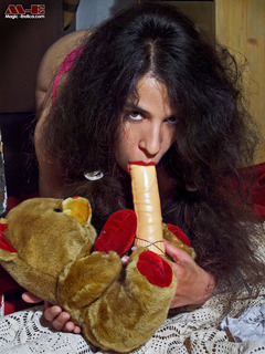 Sexy young girl playing with her teddy