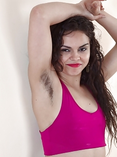 Sierra Is Doing Her Exercise In Her Pink Blouse And Black Tights