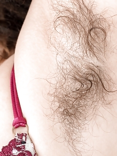 Jazmine Skye Is Relaxing In Her Armchair In A Floral Dress