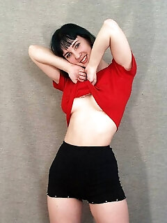 Black-haired Lady Grabbing Her Hairy Cunt