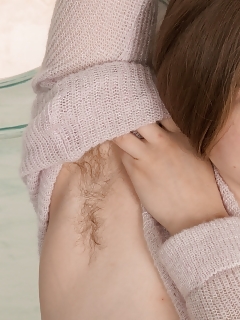 Alice Wonder Stands In Her Tiny Sweater And Shorts In Her Room