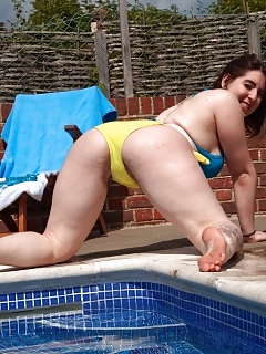 Blackhaired Girl Shows Her Sexy Black Pantiesand Legs As She Poses In Bed