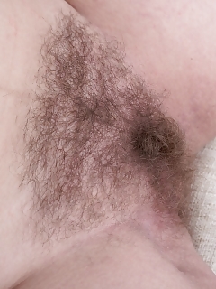 Jodie Dallas Is Exhibiting Off Her White Cap And Her Pink Dress