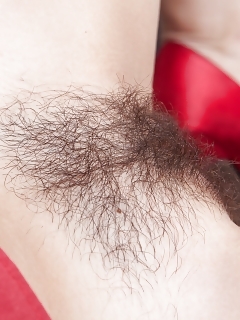 Jennifer Tate Is Relaxing On The Couch Looking Dirty In Her Plaid Blouse And Short Miniskirt With Red Shoes