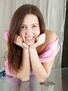 Black-haired Iveta Z Climbs Out Of Her Soft Denim Jeans And Finger Pumps Her Hairy Bush On The Cold Glass Dining Table