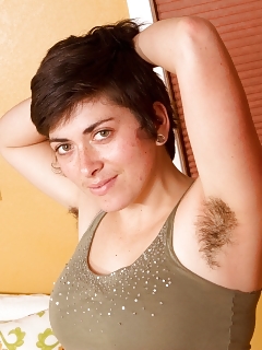 Hirsute Beauty Louise Strips Down To Her Bare Beautiful Body And Exposes Her Creamy Thighs On The Bed, Spreading Her Tight Pink Beaver.