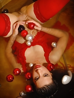 Sexy Black-haired Wearing Red Nylons, Playing In A Filthy Way With A Bottle And Christmas Balls
