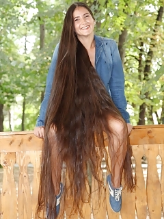 Teenagers With Long Hair Stripping Outdoors