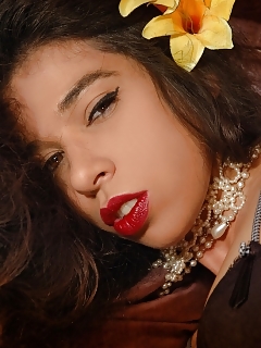 Naughty Brunette In Black Nylons Fills Her Muff With A Sex Toy In A 50's Photoshoot