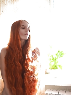 Teen Chick Posing Naked With Long Red Curly Haired
