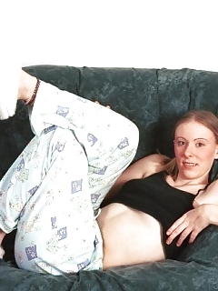Young Lady Getting Naked And Posing On Couch